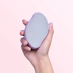 Gomme exfoliante capillaire Cypaura en crystal sur fond rose dégradé